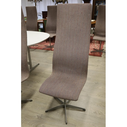 91 - Fritz Hansen model 7502 dining suite - comprising of eight Oxford swivel dining chairs to include tw... 