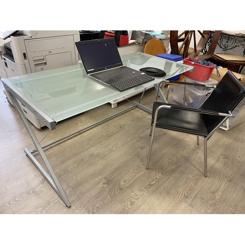 586 - Modern frosted glass topped desk and stitched black leather chrome frame office armchair, desk appro... 