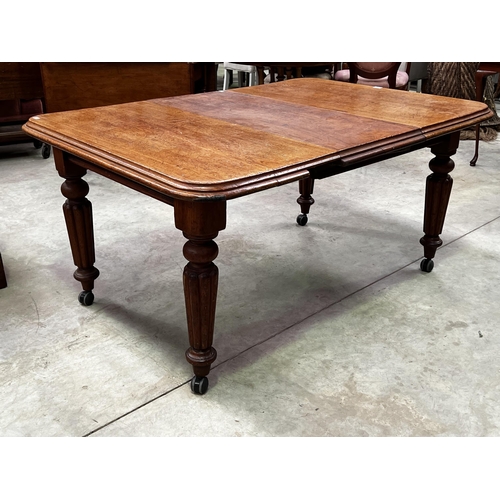 592 - Antique turned leg extension dining table, with extra leaf, approx 69cm H x 145cm W (leaf fitted) x ... 