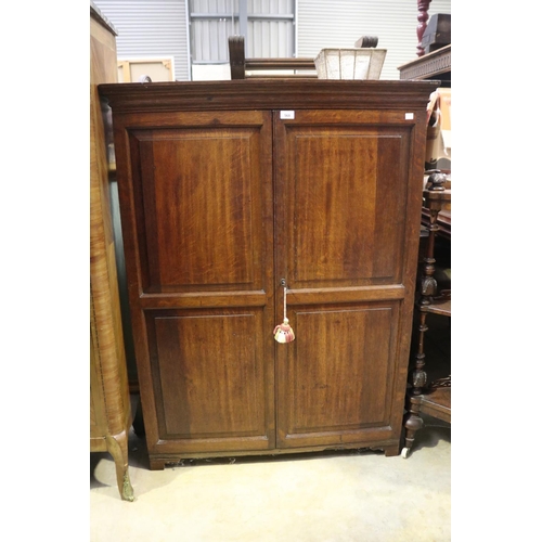 605 - Antique oak panelled two door cabinet, later feet, approx 127cm H x 94cm W x 25cm D