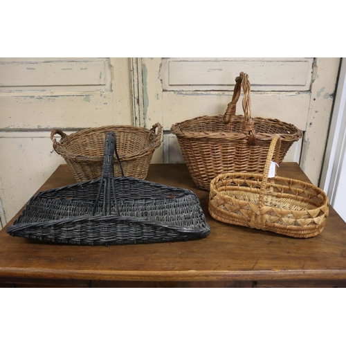 590 - An array of four French cane baskets, approx 35cm H x 41cm W x 29cm D and smaller (4)