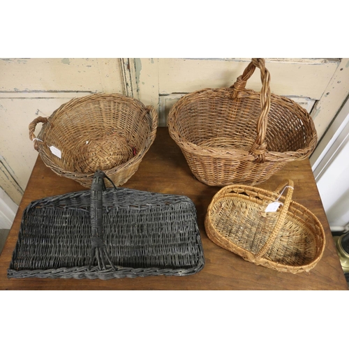 590 - An array of four French cane baskets, approx 35cm H x 41cm W x 29cm D and smaller (4)