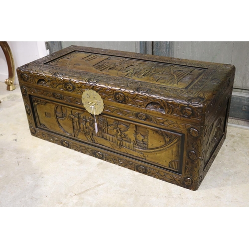 609 - Vintage Chinese carved camphor wood trunk, with brass front latch plate, approx 38cm H x 89cm L x 41... 