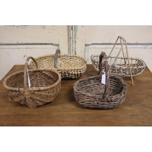 634 - Four small cane baskets, various styles, approx 34cm L and smaller (4)