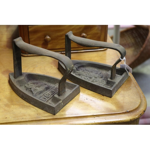 480 - Two French antique flat irons, Le Gaulois No5 and Le Parisien No 5, each approx 15cm L (2)