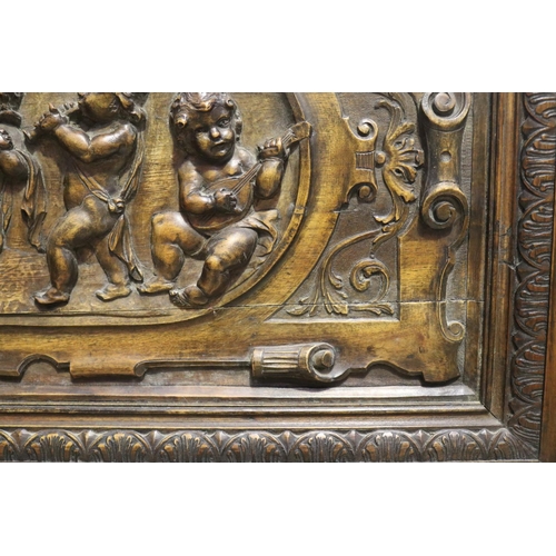 611 - RETURNED 23/7/24 - Well carved antique walnut and pine carved panel in high relief, depicting eight ... 