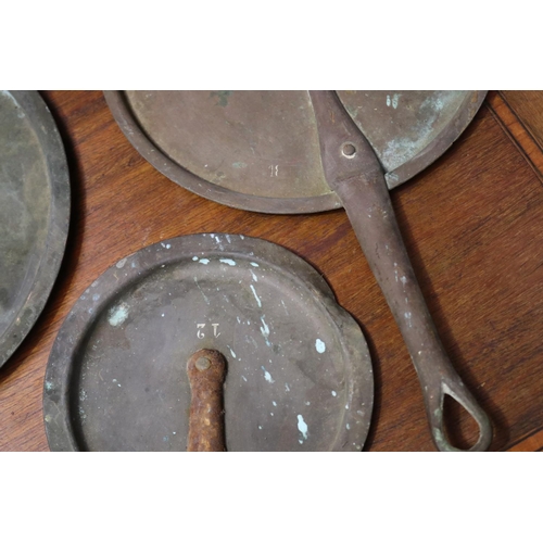 470 - Three antique copper saucepan lids, approx 22cm Dia and smaller (3)