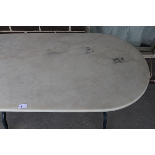 531 - Cast iron based Marble top garden table, approx 74cm H x 120cm W x 60cm D