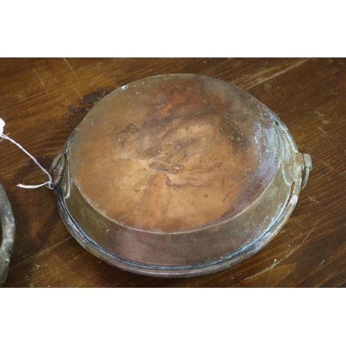 567 - Twin handle copper dish and another, approx 24cm Dia and smaller (2)
