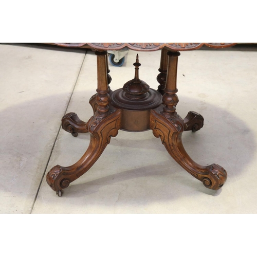 606 - Antique Victorian burr walnut loo table, with carved edge, approx 72cm H x 118cm W x 88cm D