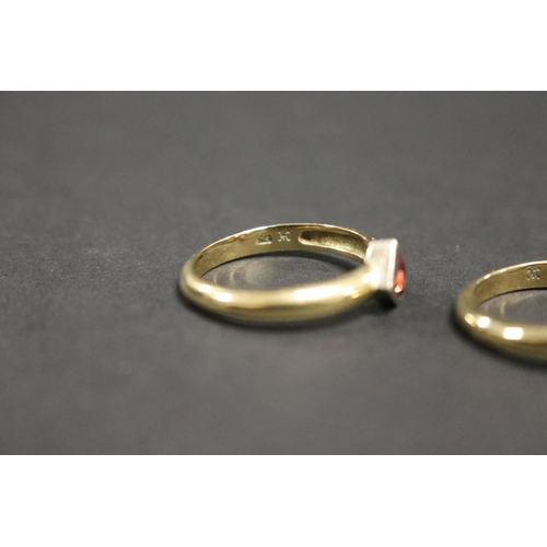 277 - Two 9ct gold rings set with diamond shaped stones, size Q, approx 6gms (2)