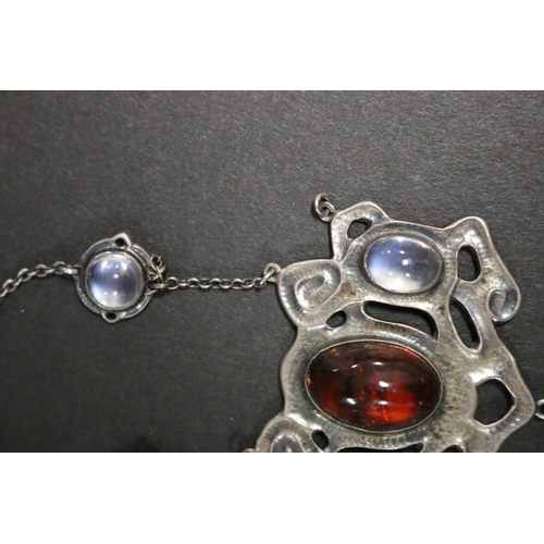 307 - Arts and Craft silver and moonstone pendant necklace