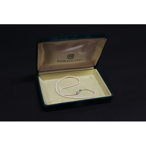 280 - Mikimoto graduated pearl necklace with silver clasp in box