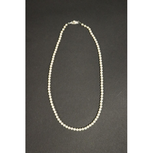 280 - Mikimoto graduated pearl necklace with silver clasp in box