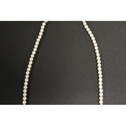 280 - Mikimoto graduated pearl necklace with silver clasp in box