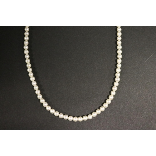 280 - Mikimoto graduated pearl necklace with silver clasp in box