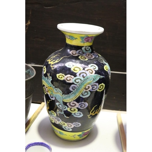 60 - Japanese Noir ground vase, with green dragon decoration.  approx 30cm H x 16cm Dia