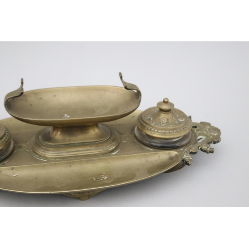 68 - Antique French bronze double pot inkstand with central urn form pen holder, marked HP to base, appro... 