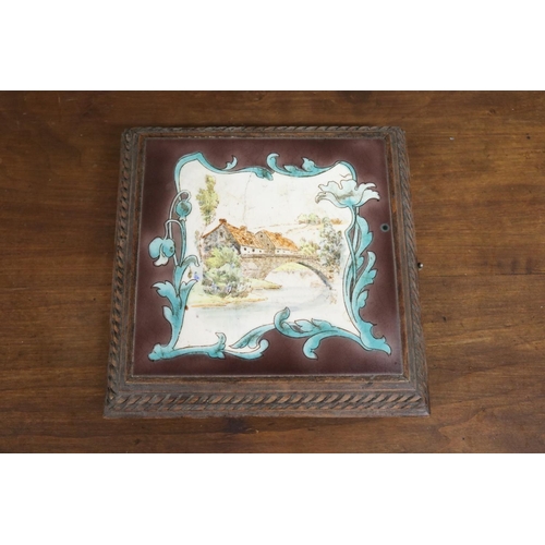 78 - Antique French musical tile, with transfer printed bridge scene tile to top, carved wooden frame, wo... 