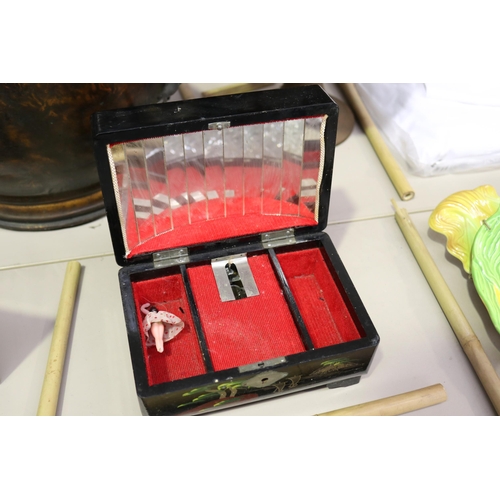 103 - Vintage black painted musical jewellery box, approx 10cm H x 18cm W x 12cm D