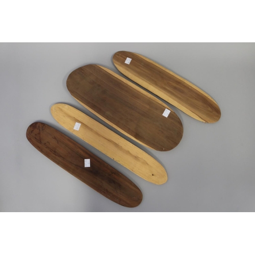 110 - Bobby Tilmouth (1942-.) Australia (Aboriginal), four hardwood leaf shape trays, approx 43cm W and sh... 