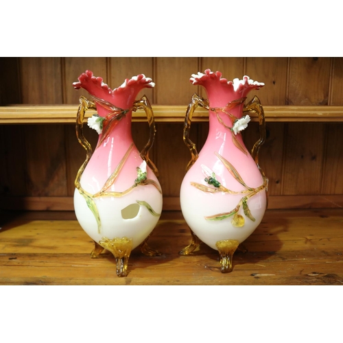 13 - Pair of decorative twin handled glass vases, with applied flower decoration (AF), each approx 37cm H... 