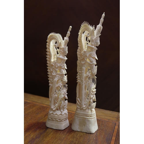 49 - Two bone carved figures, approx 21.5cm H & 19cm H (2)