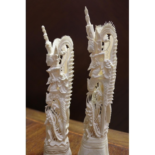 49 - Two bone carved figures, approx 21.5cm H & 19cm H (2)