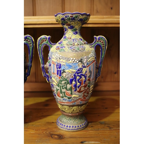 6 - Pair of antique Japanese raised enamel pottery vases, each approx 30cm H x 18cm W x 12cm D (2)
