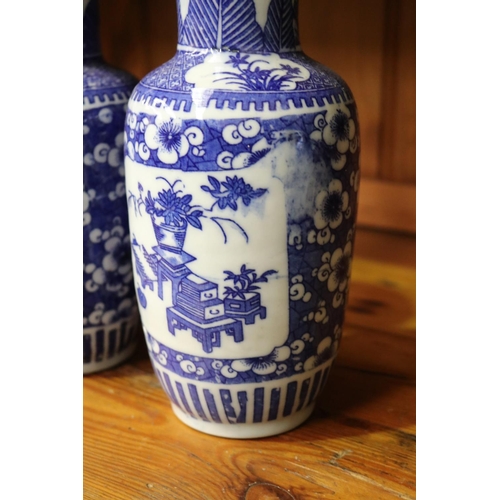 107 - Pair of Chinese blue & white vases, approx 25cm H (2)