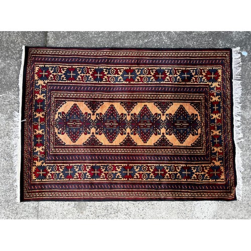 729 - Fine weave hand knotted wool carpet, approx 170cm x 125cm