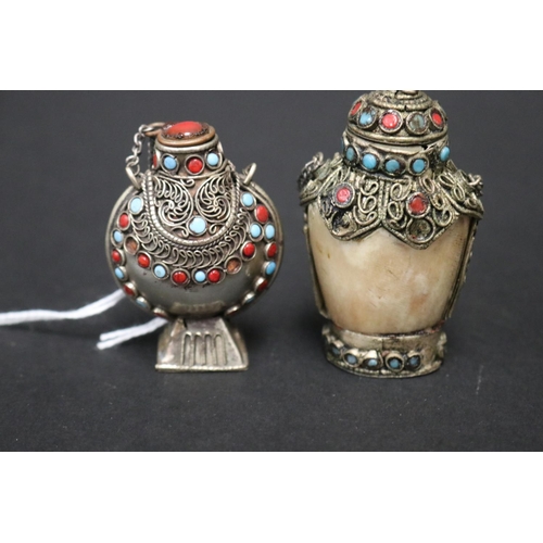 797 - Two Chinese snuff bottles, one showing age silver set with turquoise and coral, the other modern rep... 