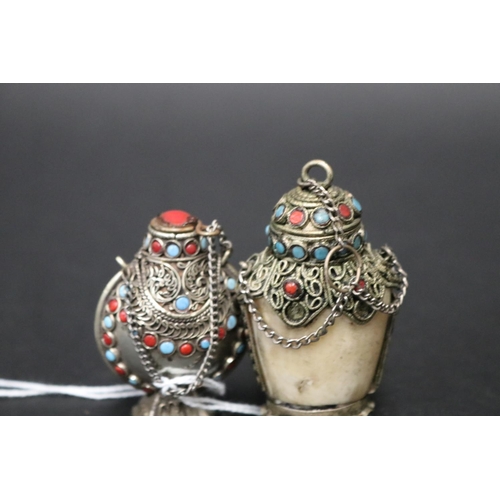 797 - Two Chinese snuff bottles, one showing age silver set with turquoise and coral, the other modern rep... 