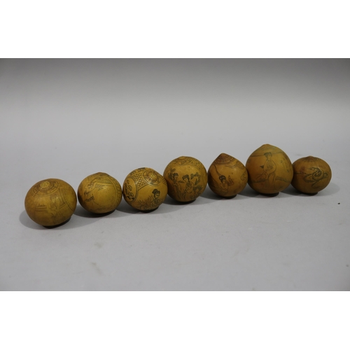 798 - Seven Chinese carved incised gourds with Chinese patterns, approx 6cm H and smaller (7)