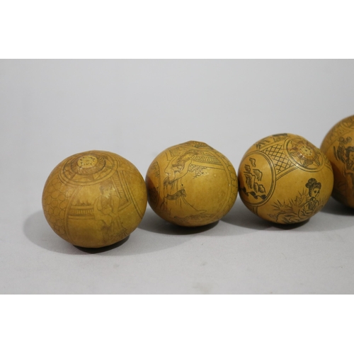 798 - Seven Chinese carved incised gourds with Chinese patterns, approx 6cm H and smaller (7)