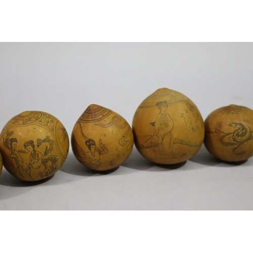 798 - Seven Chinese carved incised gourds with Chinese patterns, approx 6cm H and smaller (7)