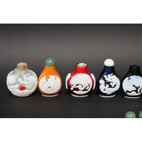 802 - Eleven Chinese Peking over lay glass snuff bottles, approx 7cm H and shorter (11)