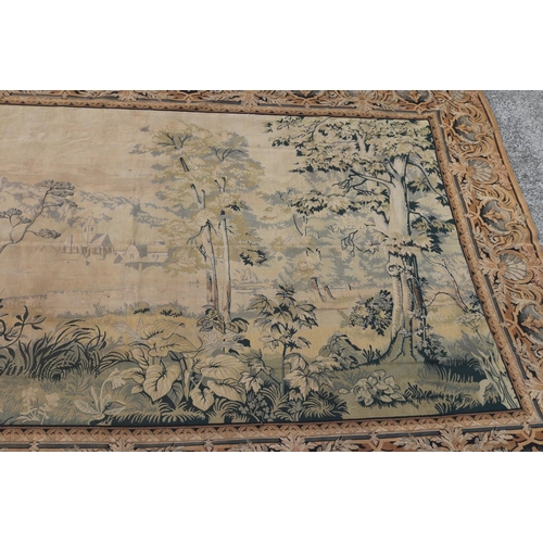 785 - Large French landscape tapestry, distant Church and buildings, boarder of alternating shell and cart... 