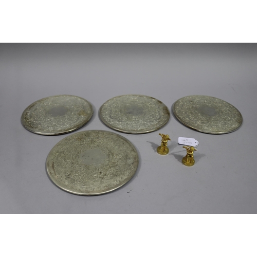 807 - Set of four silver plate circular place mats and two Italian wing Putto place markers, Ex Horden Fam... 