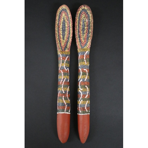 824 - Kitty Pultara Nabaljari, (Australian Aboriginal deceased) Pair of painted spoons, bean tree, dated 8... 