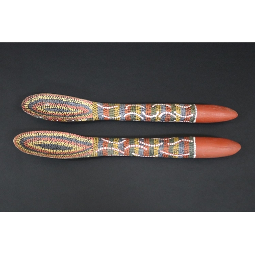 824 - Kitty Pultara Nabaljari, (Australian Aboriginal deceased) Pair of painted spoons, bean tree, dated 8... 