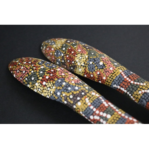 824 - Kitty Pultara Nabaljari, (Australian Aboriginal deceased) Pair of painted spoons, bean tree, dated 8... 