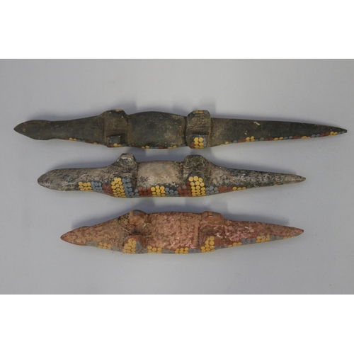 825 - Lisa Pultara (c1959-.) Australia (Aboriginal) three hand painted wood lizards (3)