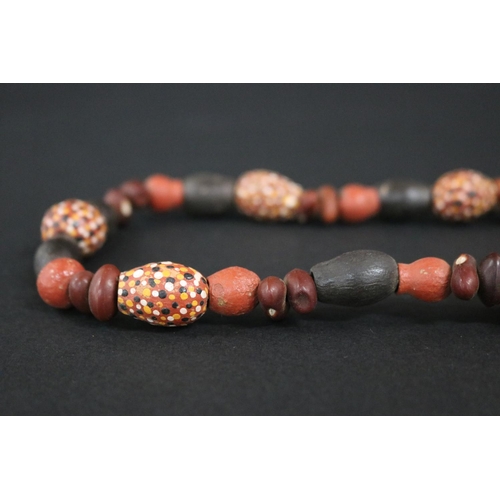826 - Lisa Pultara (c1959-.) Australia (Aboriginal deceased) Painted beads, bean tree & gumnut, 1987, Anma... 