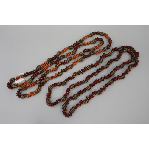 829 - Two similar length long Aboriginal poker worked bead and bean necklaces (2) circa 1980's  Napperby s... 