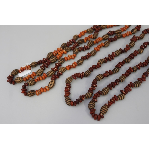 829 - Two similar length long Aboriginal poker worked bead and bean necklaces (2) circa 1980's  Napperby s... 