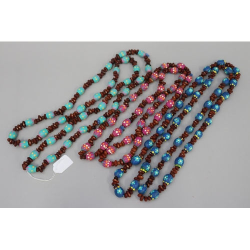 836 - Three long length colorful Australian Aboriginal painted gum nut and bead necklaces (3) circa 1980's... 