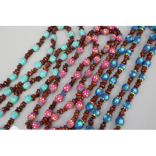 836 - Three long length colorful Australian Aboriginal painted gum nut and bead necklaces (3) circa 1980's... 