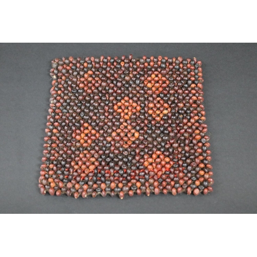 842 - Liza Pultara, (Australian Aboriginal deceased) bead mat woven with human hair & beans, 1970s, Anmatj... 