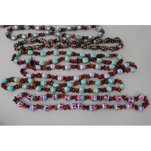 844 - Assorted length Australian Aboriginal painted gum nut & bead necklaces, circa 1980's, Napperby stati... 
